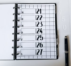 Kalender mit schwarzem Kulli